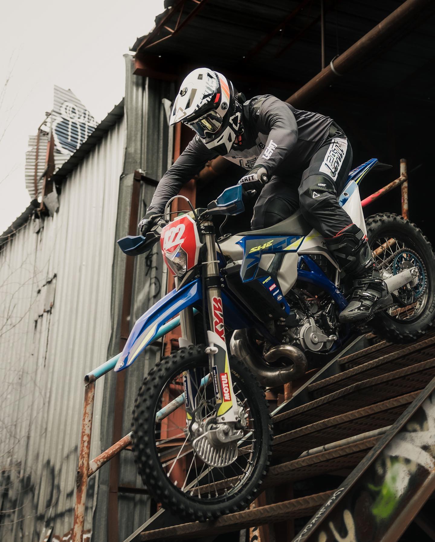 Sam King riding bike in Leatt kit